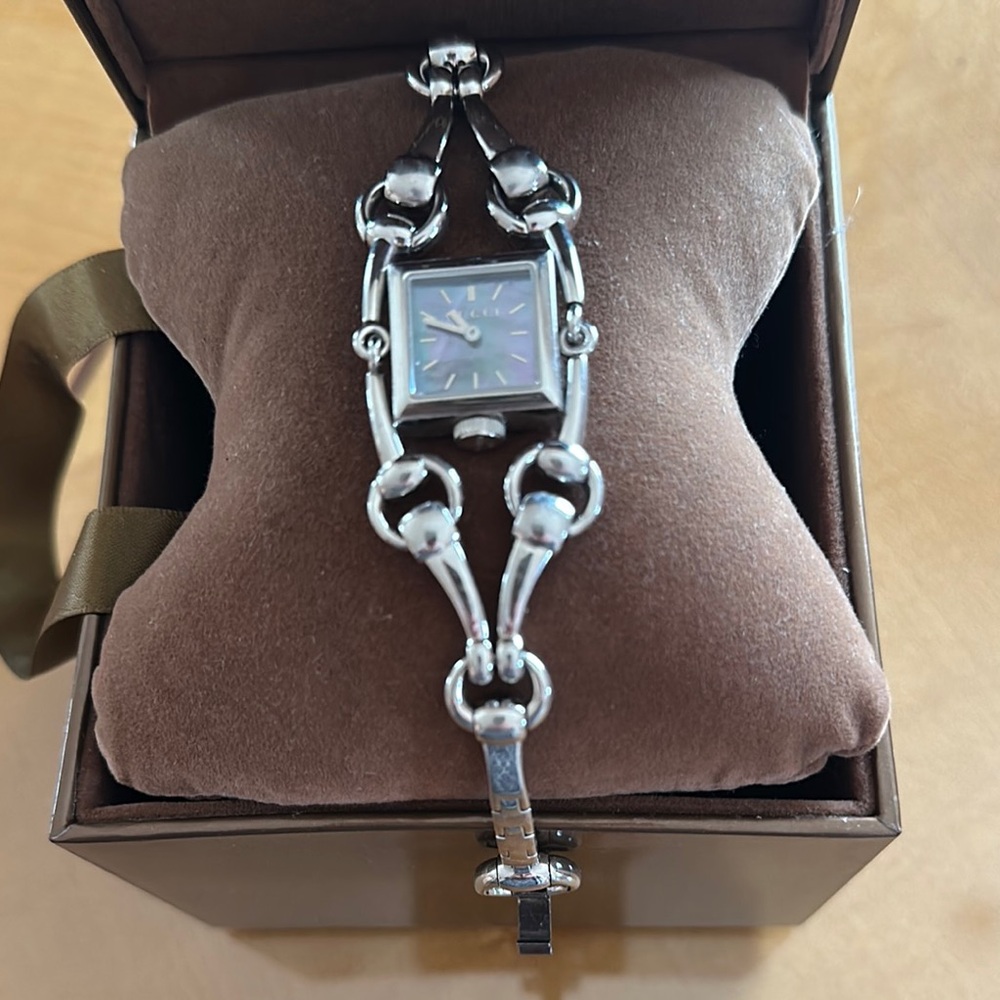 Authentic Gucci Silver Bracelet Watch.